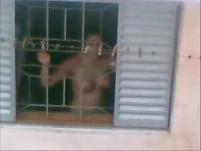 neighbour aunty nude working in kitched